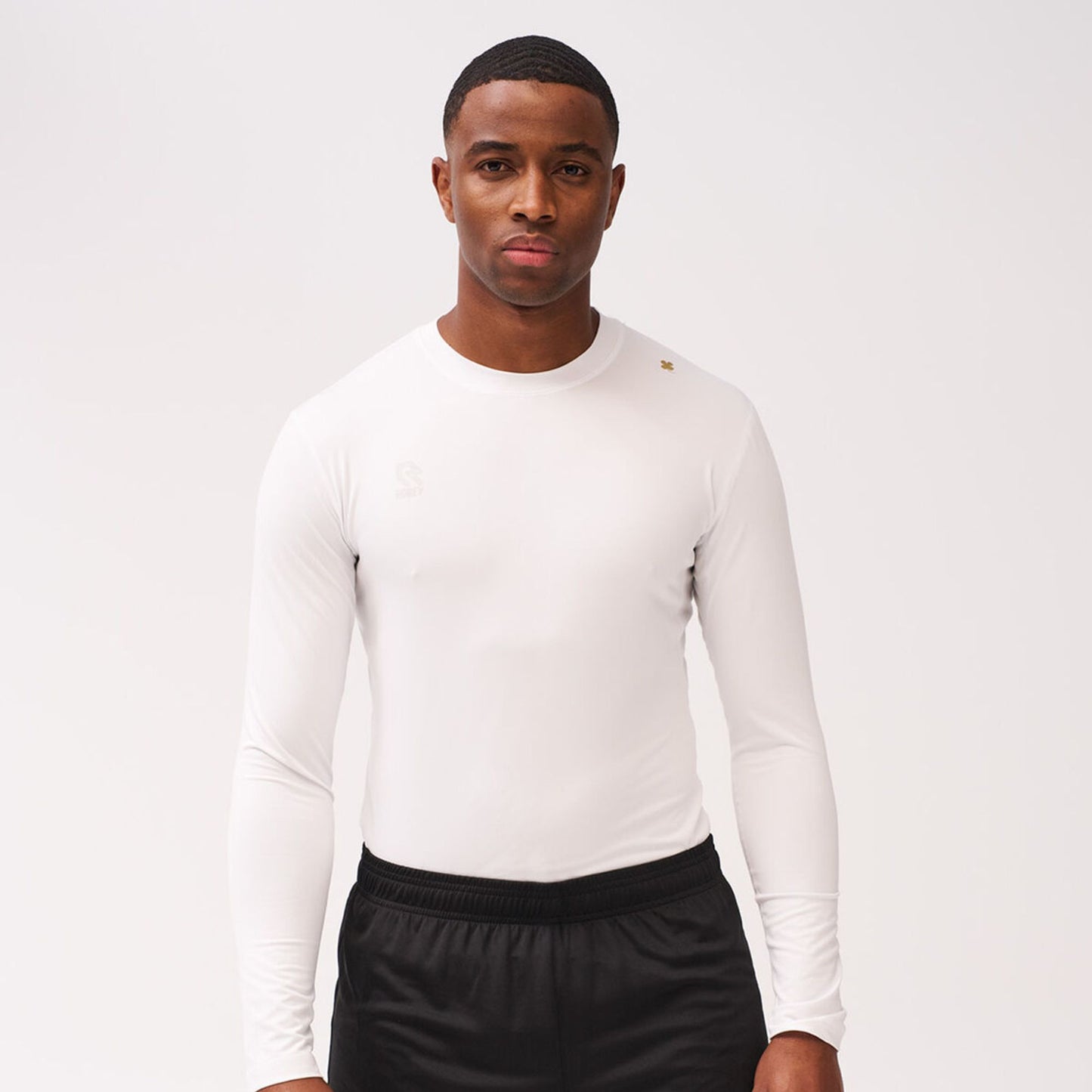 Robey wit Baselayer Shirt (thermoshirt), voorkant, perfect voor koude dagen, biedt ademend comfort voor sporters tijdens training of wedstrijden.