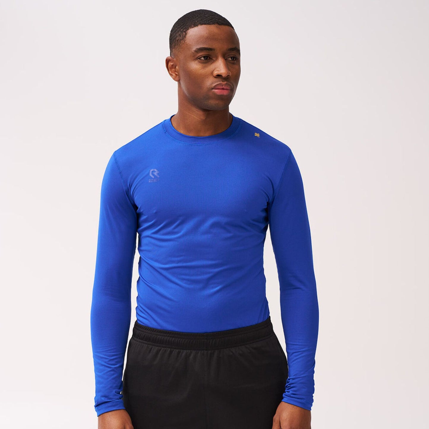 VVG blauw Baselayer Shirt (thermoshirt), voorkant, ideaal voor extra warmte en ademend comfort tijdens trainingen en wedstrijden.